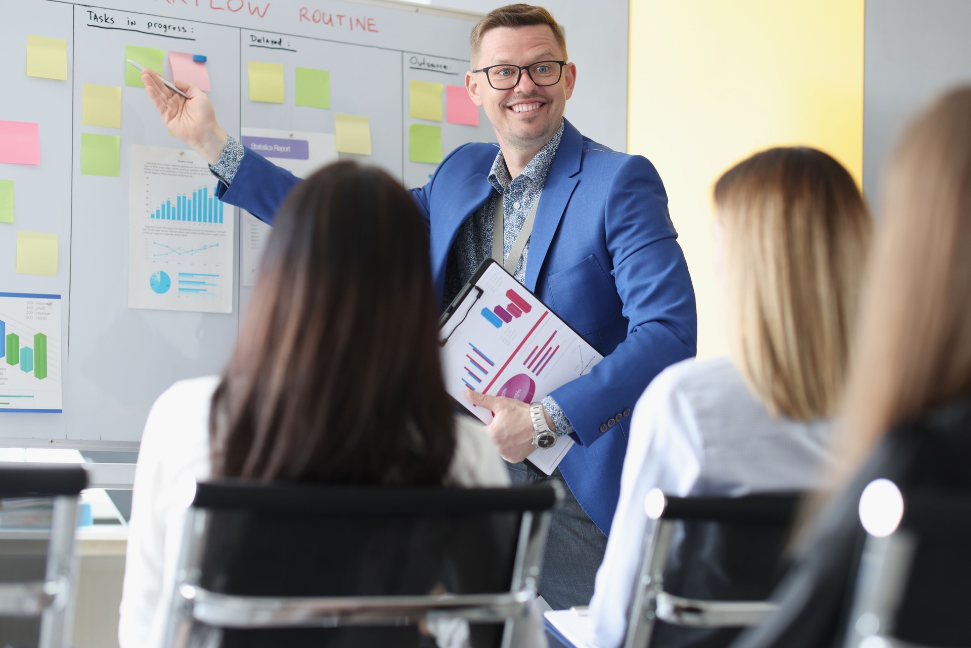 Business coach conducts training seminar for entrepreneurs